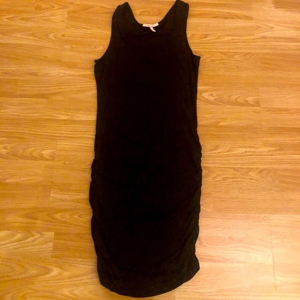 Tight-fitting little black dress.